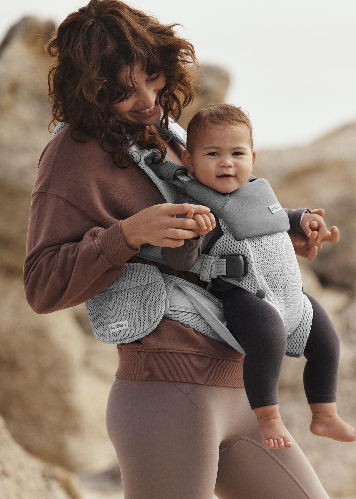 Elevate you baby wearing bib for baby carrier in grey BabyBjörn