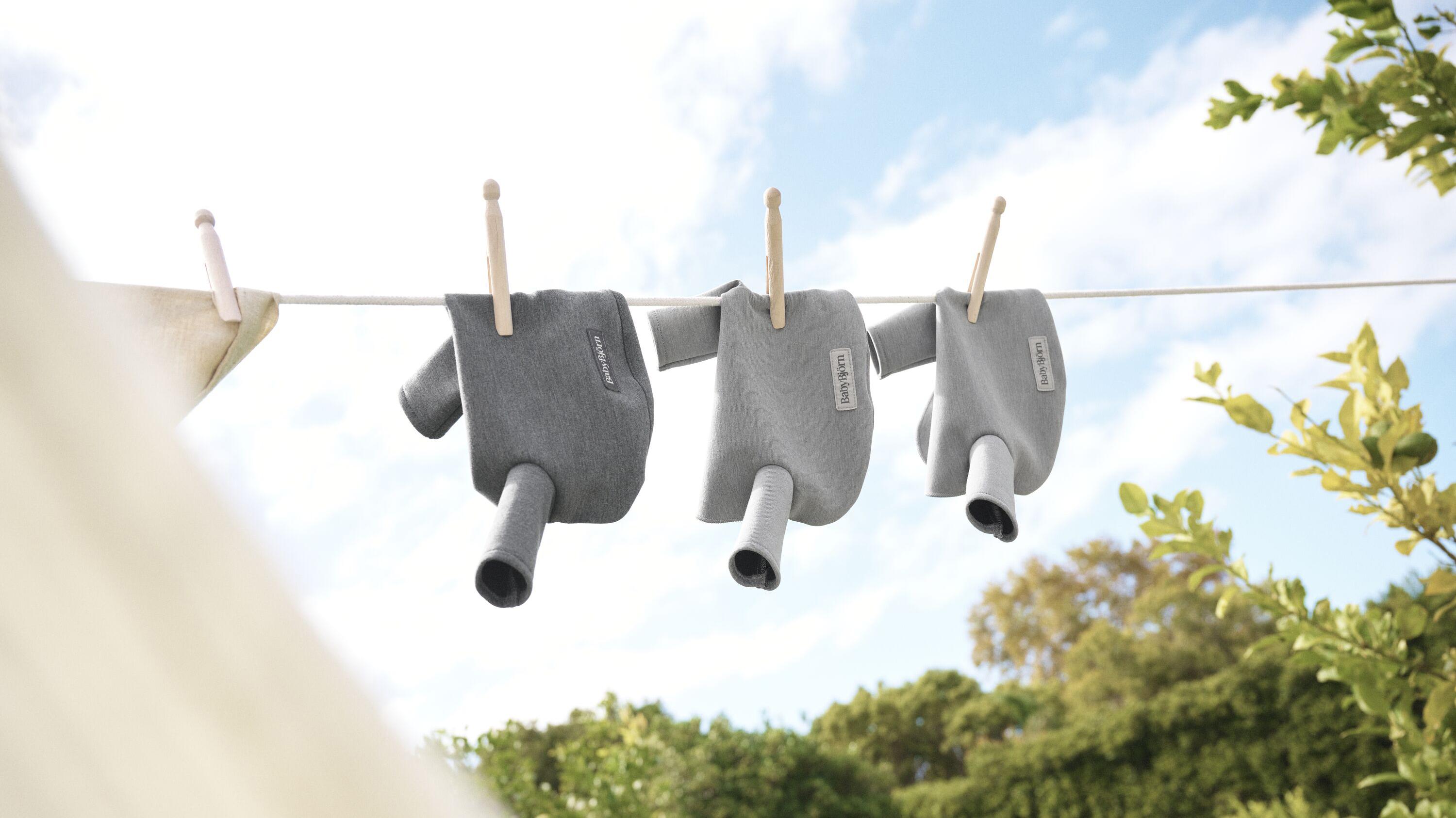 Elevate you baby wearing bib for baby carrier in grey BabyBjörn