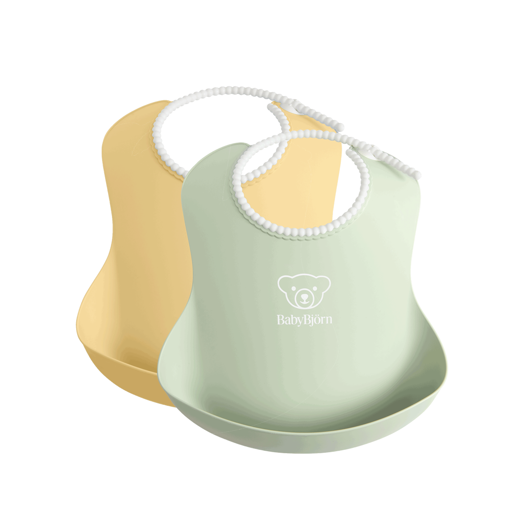 Baby Bib in 2-pack with deep spill pocket powder yellow and powder green - BabyBjörn